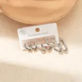 Silver stainless steel hoop earring set with geometric heart and round shapes. - Heart-Shaped Hoop Earring Set (EXRGE0319-2)