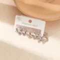Set of three silver stainless steel earrings featuring classic hoop and wavy star designs - Irregular Hoop Earring Set (EXRGE0318-2)