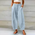 Light blue loose fit cropped harem pants with high waist and pleated details - Light Blue