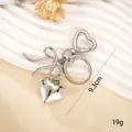 Silver metallic bow and heart keychain pendant, 9.3cm length and 19g weight for bag charm - Smooth Heart Charm