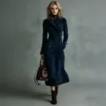 Elegant long navy blue double-breasted suede-textured trench coat worn by a model in studio - S / Tops / Blue