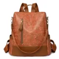 Brauner Blumen Geprägter PU Leder Rucksack Damen Vintage Anti-Diebstahl Schultasche - Braun