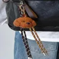 Cute brown plush puppy keychain with braided ropes, stylish backpack accessory and bag charm. - Set With Pendant
