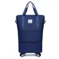 Large capacity foldable travel duffel bag with universal wheels in dark blue for storage. - Dark Blue