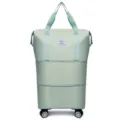 Λεπτομερής όψη της επεκτάσιμης τσάντας ταξιδιού με τροχούς και μεγάλη χωρητικότητα. - Πράσινο