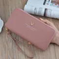 Women's long wallet zipper clutch PU leather litchi pattern coin purse with wrist strap. - Pink
