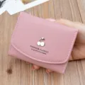 Cute pink short wallet for women, soft leather folding purse with chic metal cherry decor. - Pink