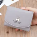 Grey short wallet for women, soft leather folding purse with cute metal cherry charm design. - Gray