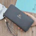 Grey women's long zip-around wallet and clutch with wrist strap, elegant fashion design. - Long Clutch / Gray