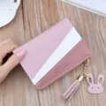 Women short color block wallet with zipper tassel and cute rabbit charm for daily use. - Light Pink