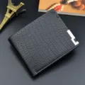 Men's black short wallet with crocodile pattern texture and metal card slot detail. - Black