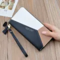 Women's long color block wallet stylish PU leather clutch purse with strap and tassel. - Black