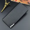 Men's long black wallet with crocodile pattern texture, multiple card slots and stylish design. - Black