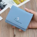 Light blue short leather wallet for women, compact folding card holder with cute butterfly print. - Blue