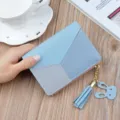 Women color block short wallet PU leather coin purse with cute tassel charm for daily use. - Blue