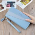 Light blue women long wallet PU leather zipper clutch purse with wrist strap and tassel charm. - Blue