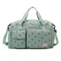 Green corduroy travel duffel bag with cute red strawberry print, large capacity gym bag. - Fruit Green