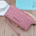 Pink long wallet with floral embroidery, zipper closure, and wrist strap for daily use. - Dusty Pink