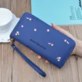Women's long zipper wallet clutch with floral embroidery and wrist strap. Blue soft leather purse. - Sapphire Blue