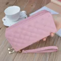 Pink quilted long wallet for women with double zipper, crown embroidery and handy wrist strap. - Peach Pink