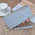 Graue gesteppte Kronen Geldbörse, elegante doppelte Reißverschluss Clutch Tasche für Damen. - Grau
