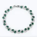 Elegant silver-tone green zircon wavy link bracelet for women, chic fashion party jewelry. - Silver and Green