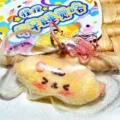 Detailed close-up of a cute cartoon silicone squishy toy keychain with soft touch and vent design. - Dog