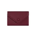 Burgundy leather mini wallet and card holder for women, slim design with secure snap button. - Wine Red
