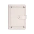 Light beige denim passport holder with metallic rivets and snap closure for travel use. - White