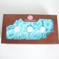 Preserved blue rose heads in box detail, perfect for DIY floral arrangements and crafts. - Tiffany Blue