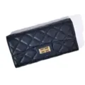 Black quilted long wallet for women, classic flap design with metal turn-lock closure. - Black