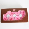 Detailed view of preserved pink rose heads in a window gift box, ideal for DIY floral decor. - Pink
