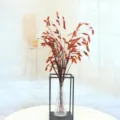 Bouquet di erba secca nordica con vaso in vetro e struttura in metallo, perfetta decorazione per la casa. - Arancione