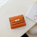 Orange PU leather trifold short wallet for women, minimalist compact card holder purse. - Orange