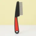 Fine-toothed pet flea comb with anti-slip handle and dense metal pins for facial grooming details. - L / Black Red