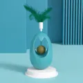 Cat mint ball tumbler toy with feathers in teal, interactive pet toy for indoor cats. - Green