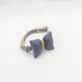 Detail shot of cute pet collar with grey bow tie, adjustable strap and metal ring. - 1.0 (19-32cm) / Blue
