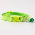Green pet collar with paw prints, bell, and safety buckle, suitable for cats and dogs. - Paw Print Style / Light Green