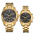 Elegante juego de relojes de pareja dorados con esfera negra y números romanos clásicos. - Caja dorada con esfera negra para hombre