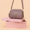 Women greyish purple multi-pocket crossbody shoulder bag with golden hardware stylish daily use. - Pink