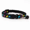 Black pet collar with colorful paw and bone prints, safe buckle and bell for cats and dogs. - Paw Print Bone Style / Black