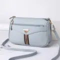 Soft leather crossbody bag for women, multi-pocket casual shoulder bag with adjustable strap. - Blue