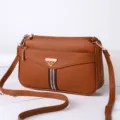 Brown leather crossbody shoulder bag for women, multi-zipper chic everyday handbag. - Brown