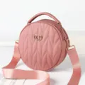 Pink round quilted handbag with top handle and wide adjustable shoulder strap for women style. - Pink
