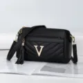Black quilted crossbody bag with gold V logo, stylish leather shoulder bag for women daily use - Black