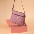 Women pink quilted crossbody bag with heart embroidery and bow charm for daily casual wear. - Oak Red