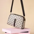 Stylish vintage monogram crossbody bag for women, featuring a classic rose pattern and chic strap. - White Letters