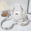 White quilted PU leather handbag with wide strap, elegant crossbody shoulder tote bag for women. - White
