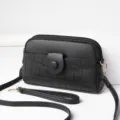 Black crossbody mini phone bag with multiple zipper compartments and adjustable strap for women. - Black