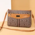 Women brown monogram crossbody bag with stripe detail, stylish shoulder handbag for use. - CLN